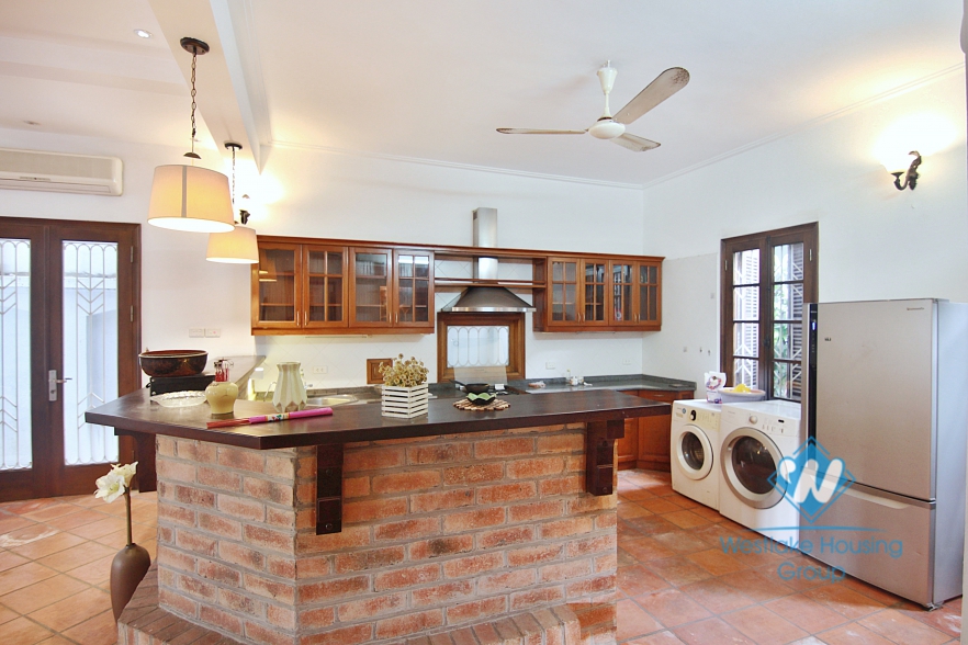 Cosy house with large yard and garden for lease in Xuan Dieu street, Tay Ho, Hanoi